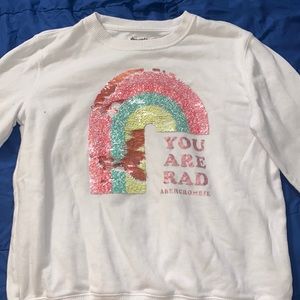 size 13/14, white, sequence sweater (no refunds)